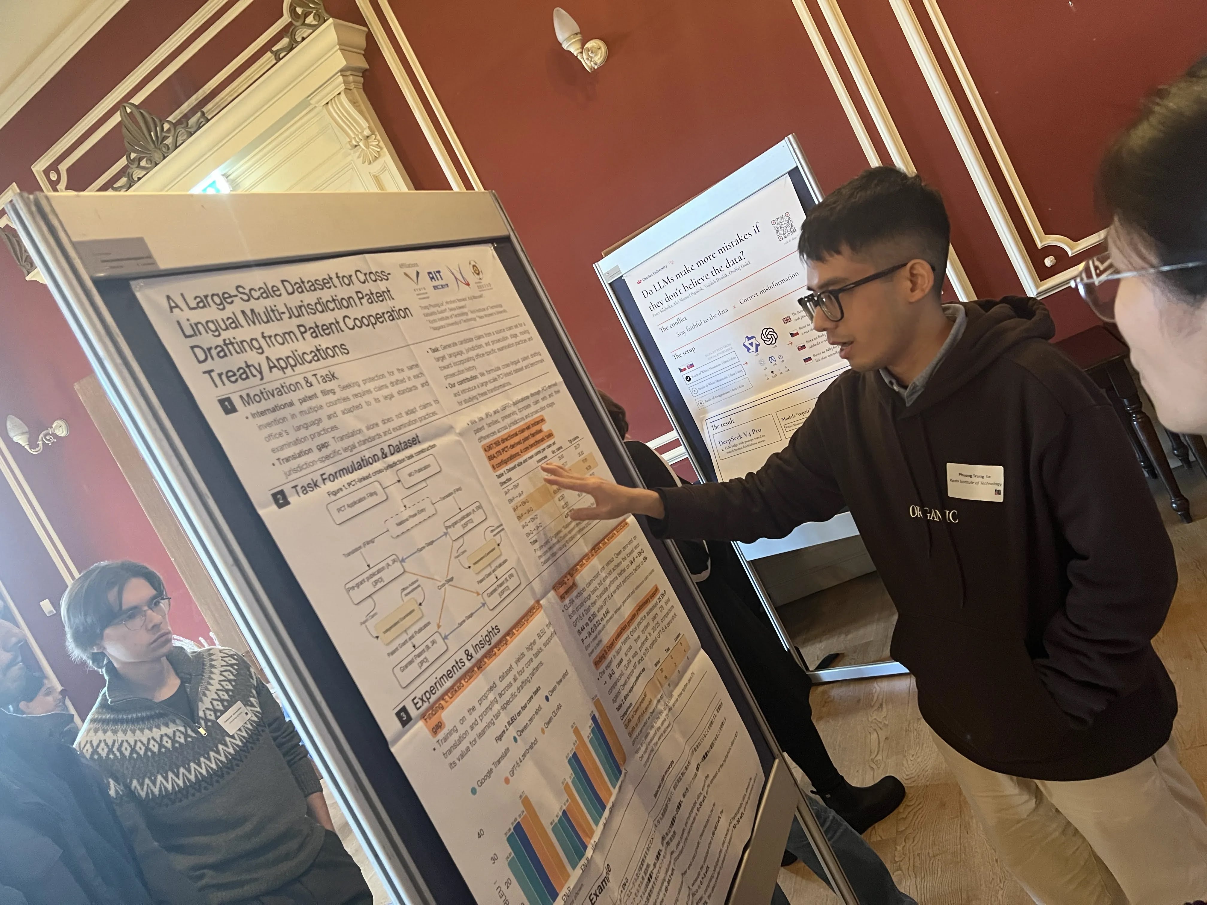 Discussing my cross-lingual patent drafting poster with attendees at the YNLG workshop