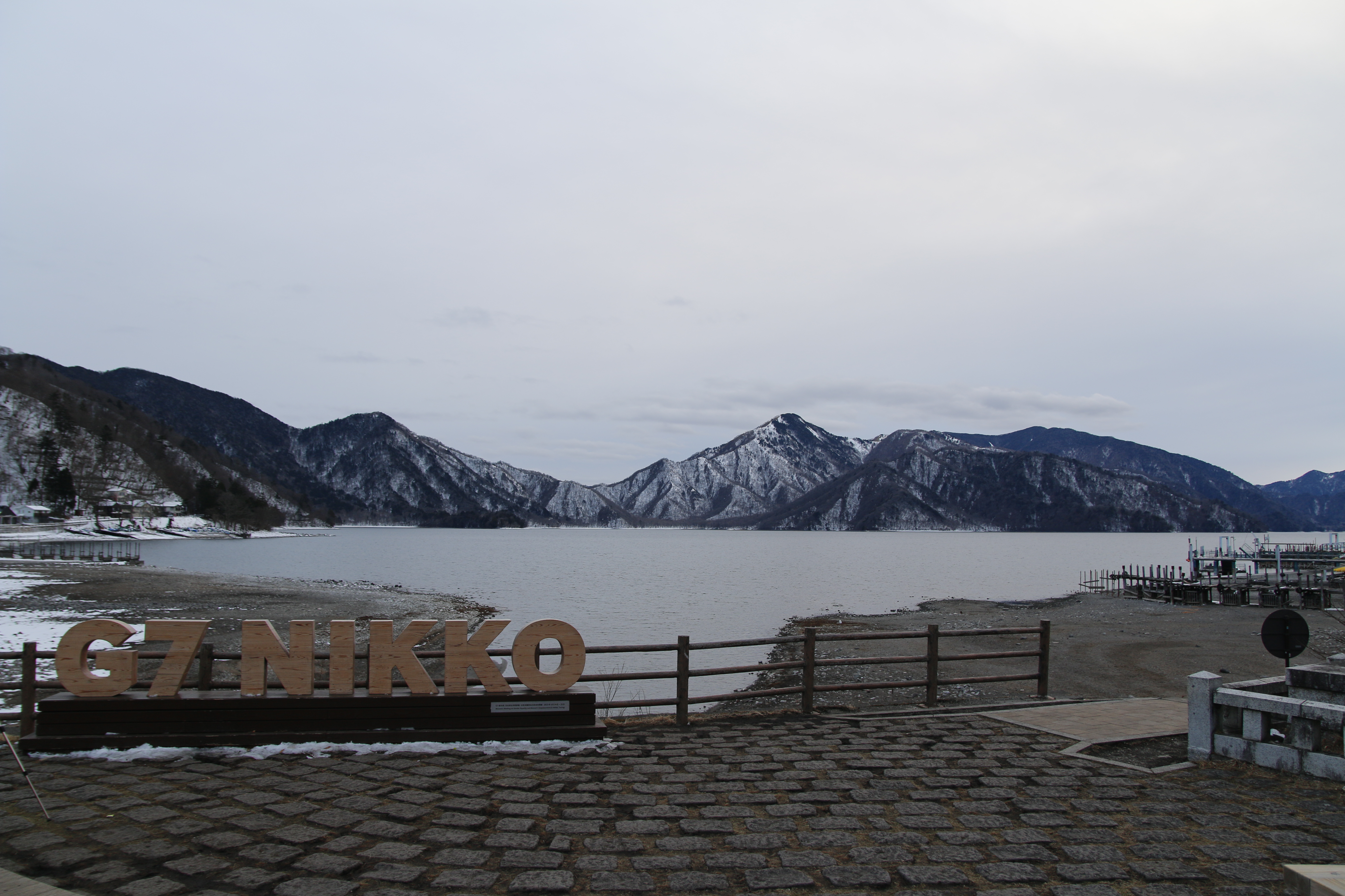 Lake and snow-covered mountains in Nikko