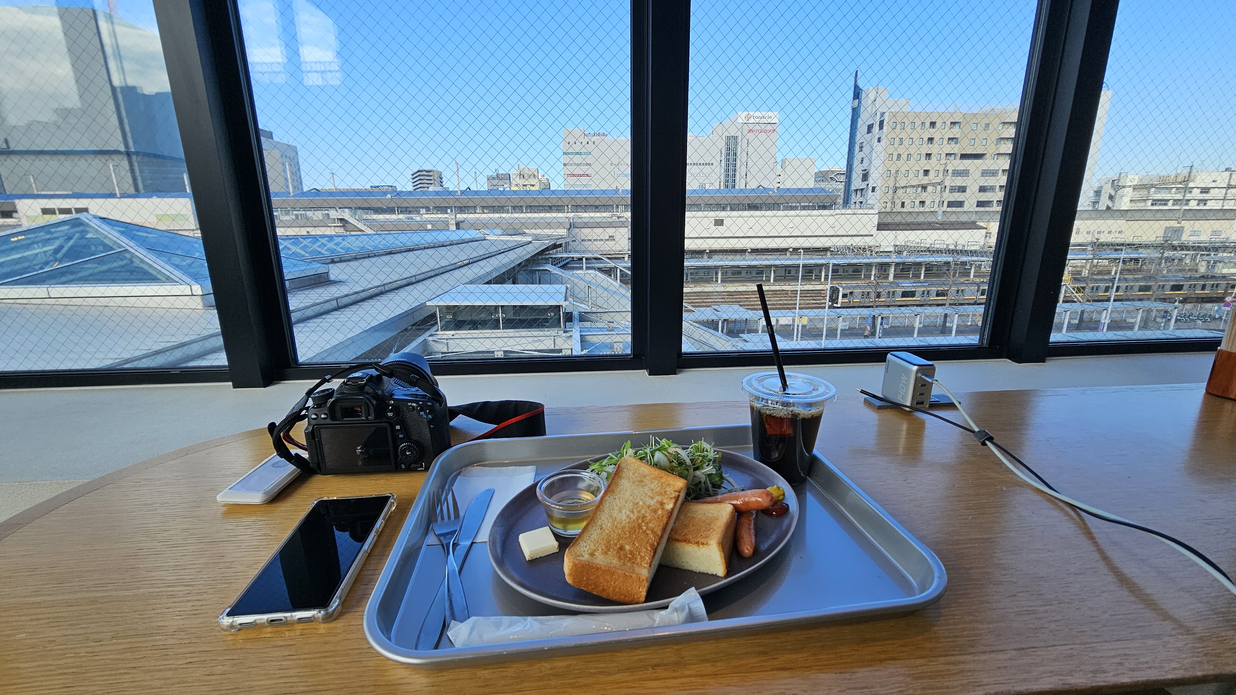 Breakfast and a camera overlooking Utsunomiya Station